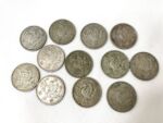 X100円銀貨鳳凰12枚 (1)